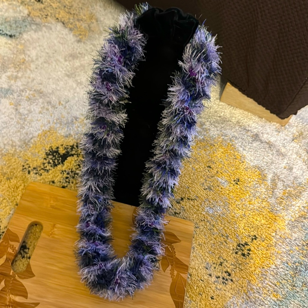 Hawaiian crochet yarn/eyelash yarn lei.